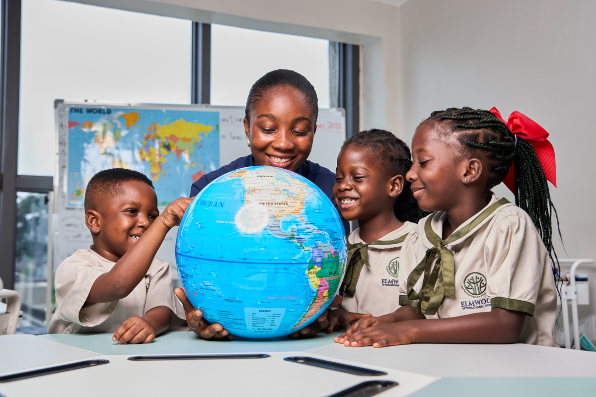 Students at Elmwood International School engaged in collaborative learning activities